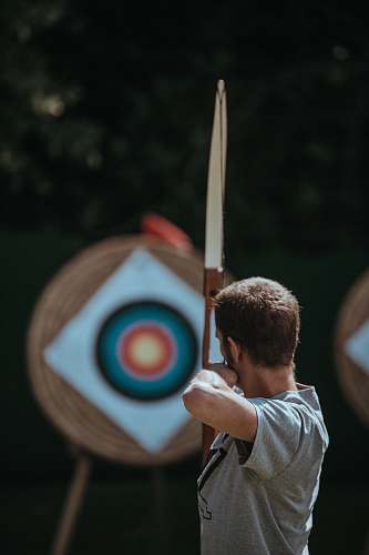 human white and brown composite bow archery