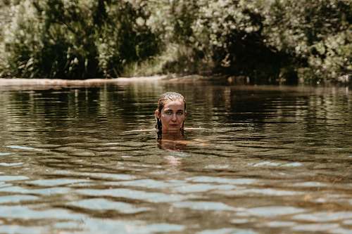 person woman swimming at river human