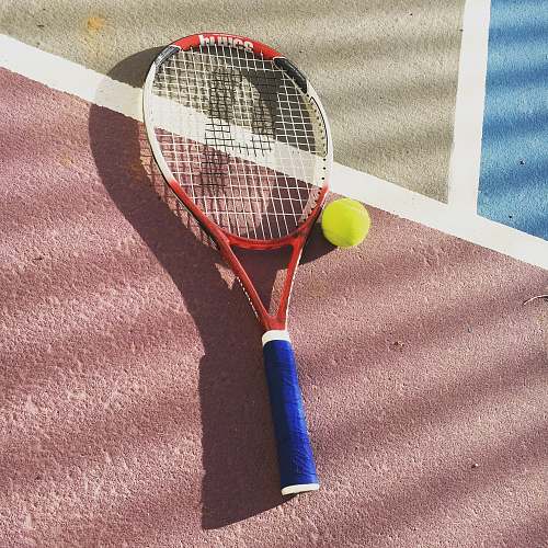 tennis yellow and white tennis racket racket