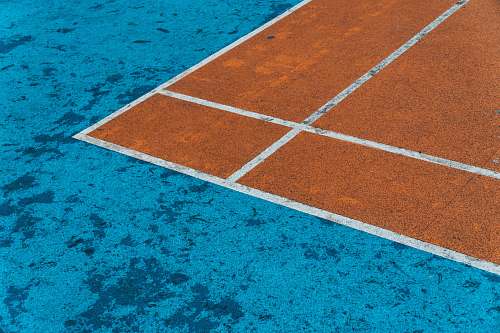 sport brown and blue surface close-up photography tennis court