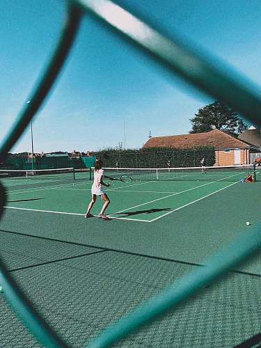 human woman playing tennis on court tennis court