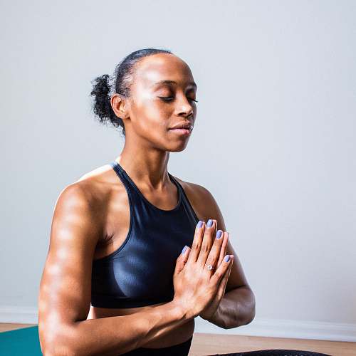 yoga woman wearing black sports bra fitness