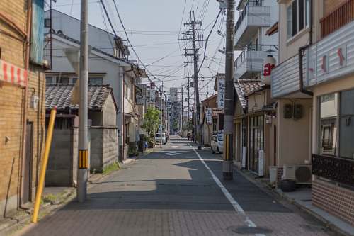 town empty street between buildings urban