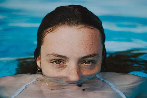 sports woman face close-up photography swimming