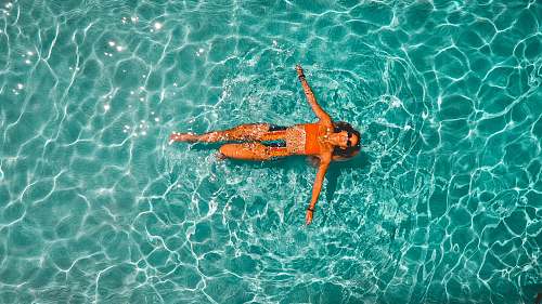 swimming woman swimming alone in body of water sport