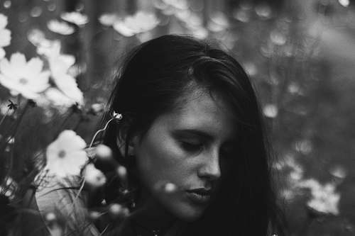 human grayscale photo of woman person