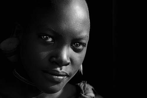 people grayscale photography of person portrait
