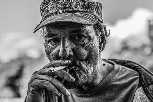 face man smoking cigarette portrait