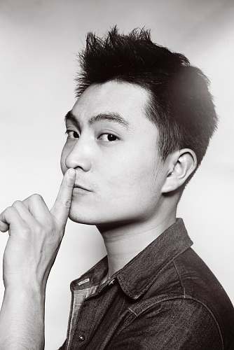 portrait man kissing his finger person