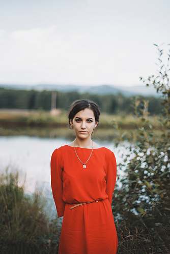 person woman standing in front of body water human