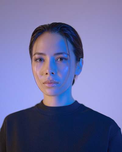 portrait woman wearing black crew-neck shirt person