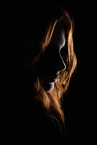 portrait woman's face on black background ornament