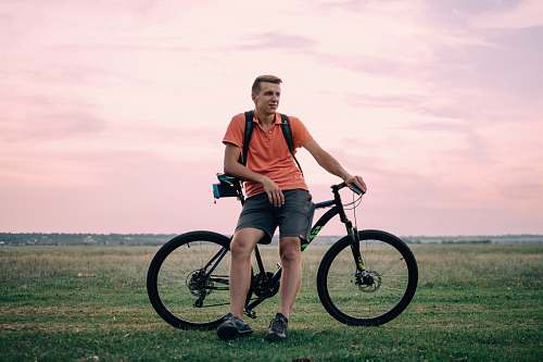 bike man sitting on hardtail bike under golden hour bicycle