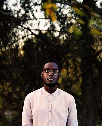 human man wearing white button-up shirt people