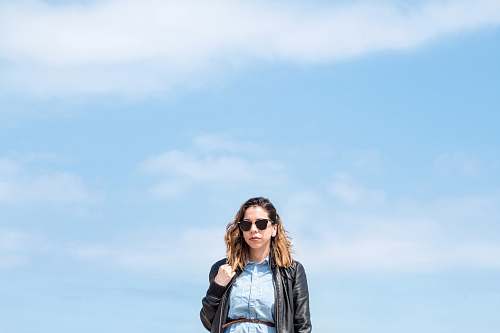 human woman wearing black zip-up jacket people