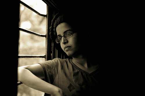 person woman looking out through window human