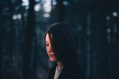 person woman wearing black top outdoors