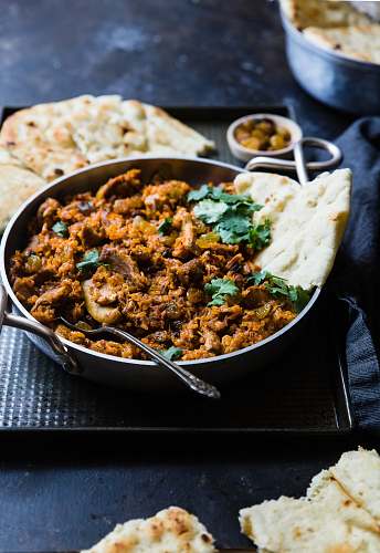 food cooked meat on pan curry