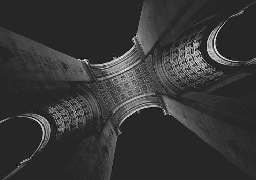 black-and-white low angle photography of building architecture