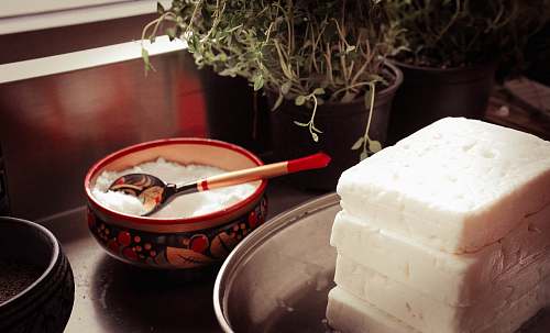 cream red ceramic bowl on gray spoon creme