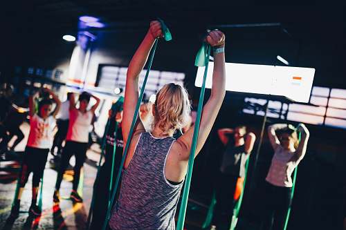 person group of people in gym while exercising human