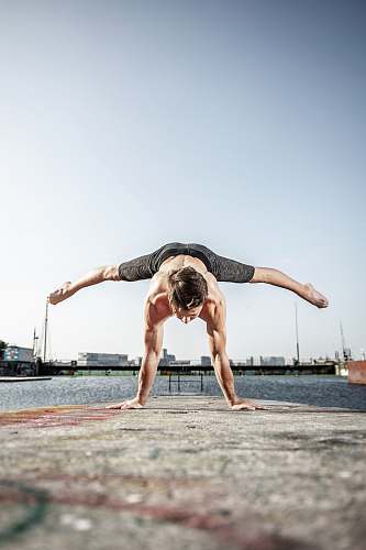 person man in gray top yoga