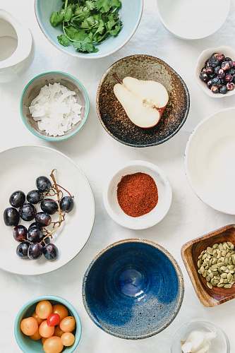 produce An overhead shot of fruits, seeds and spices in bowls health