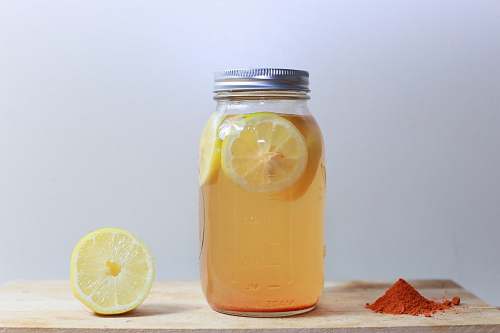 drink clear glass mason jar on brown surface jar