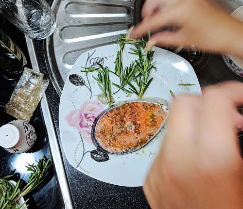 human cooked food close-up photography seasoning