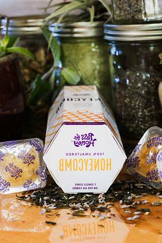 plant Pass the Honey honeycomb box across glass jars confectionery