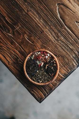 tea powder filled brown bowl table