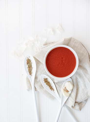 white spices on ceramic containers red