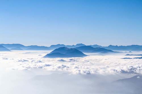 nature aerial photography of mountains blue