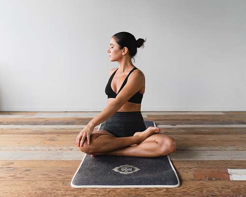 human woman performing yoga fitness