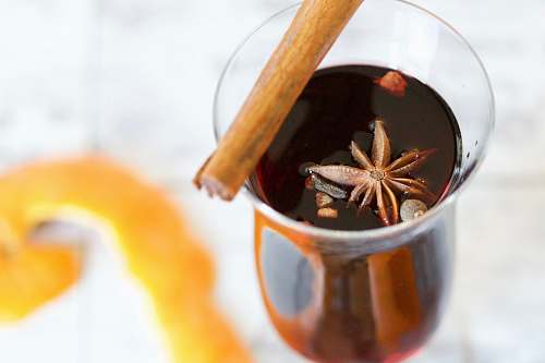 food clear hurricane glass with red liquid sea life