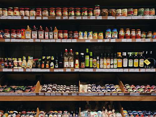 market assorted-labeled bottle display on rack shop