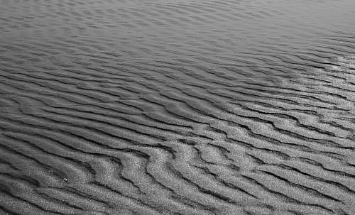 sand grayscale photography of sand black-and-white