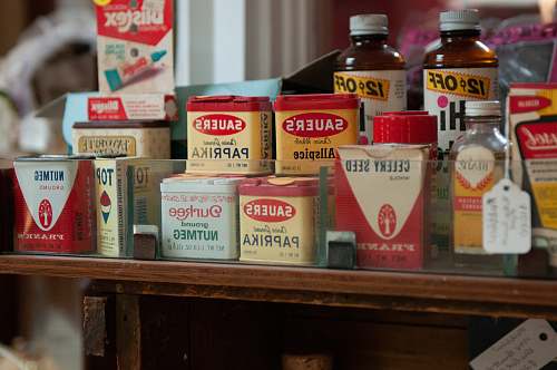 bottle Sauer's products on table herb