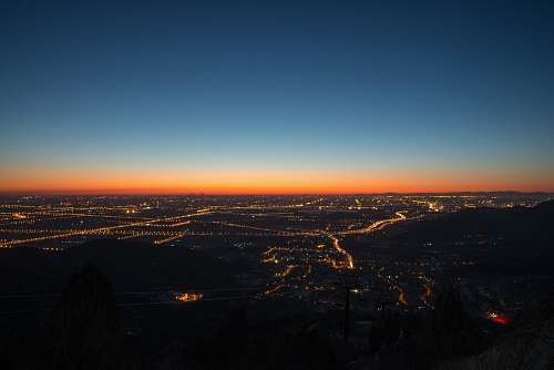 landscape aerial view of city during night time sunrise