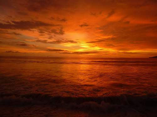 sky body of water during golden hour sunrise