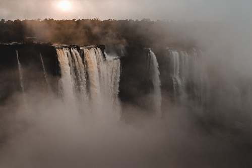 nature aerial photography of waterfalls at day time river