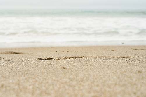 ocean shallow focus photography of coast line beach