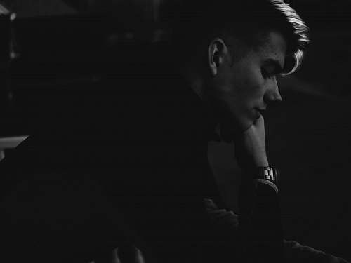 person grayscale photo of man black-and-white