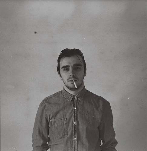 person man with cigarette grey