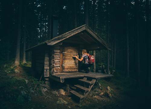 home girl knocking on wooden door hike