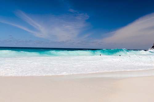 water seashore during daytime coast