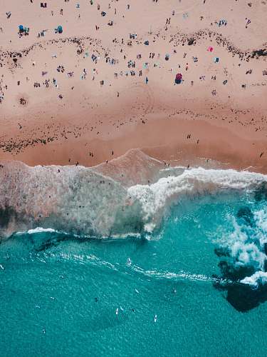 water top view of people near beach shore ocean
