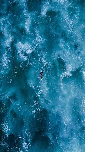 surf person swimming on body water somo