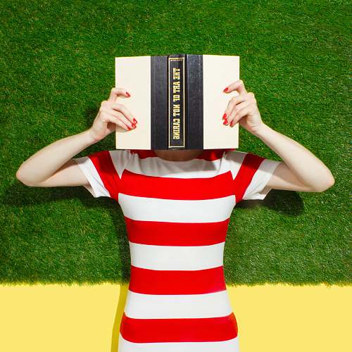 akron person holding black and beige book united states