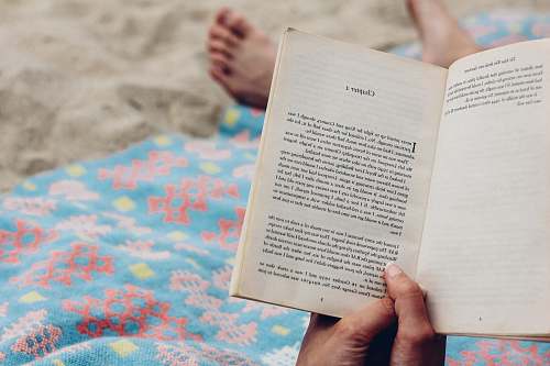 reading person reading book foot